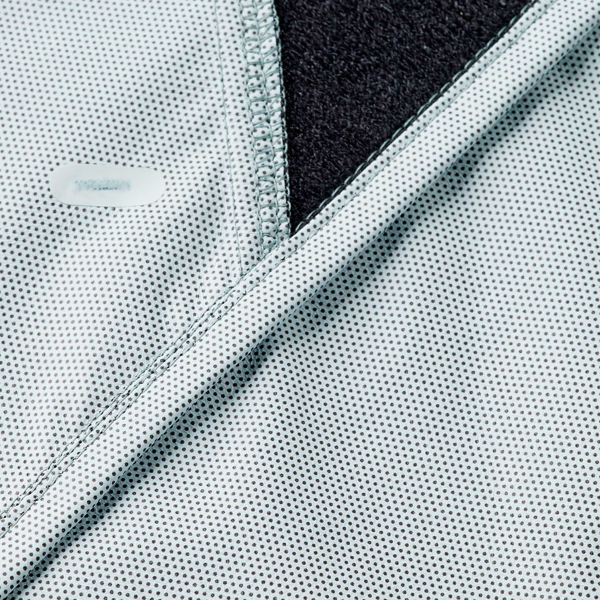 Mizuno manteau de course à pied Tech Thermal Charge BT homme détails - Noir