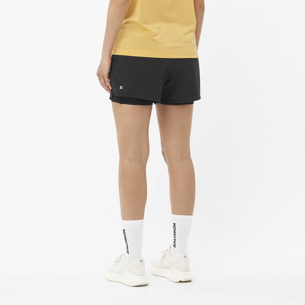 Salomon SHAKEout short sport 4 pouces 2-en-1 pour femme dos - Deep Black