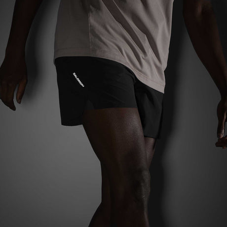 Salomon SHAKEout Core 5 po short de course à pied pour homme logo réfléchissant - Deep Black