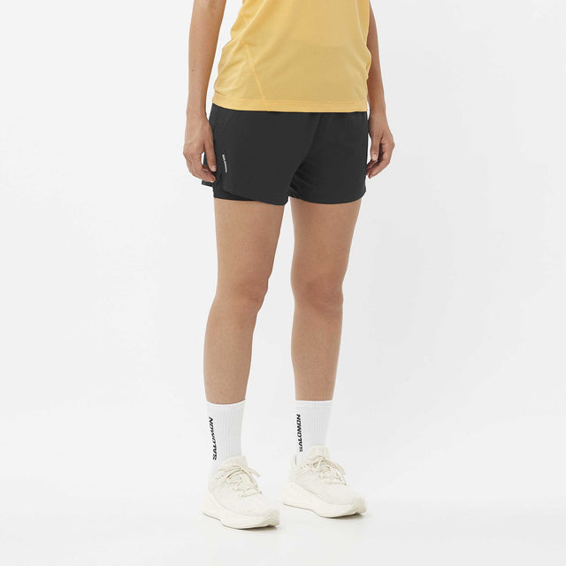 Salomon Salomon SHAKEout short sport 4 pouces 2-en-1 pour femme