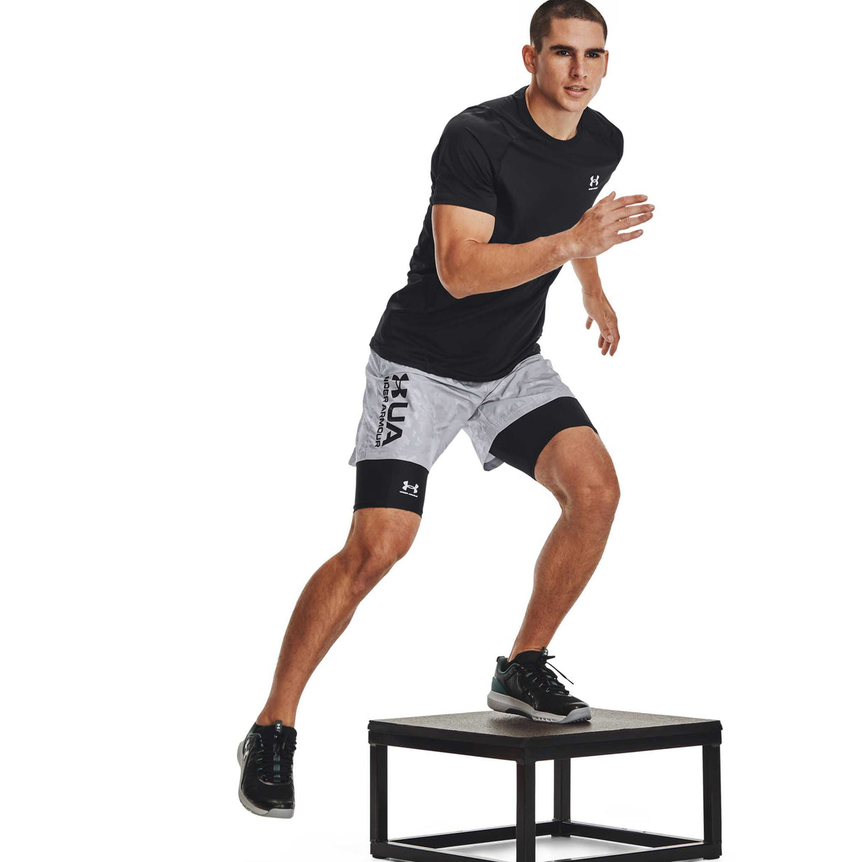 UA HeatGear Shorts 9 po avec poche pour homme action - Noir / Blanc
