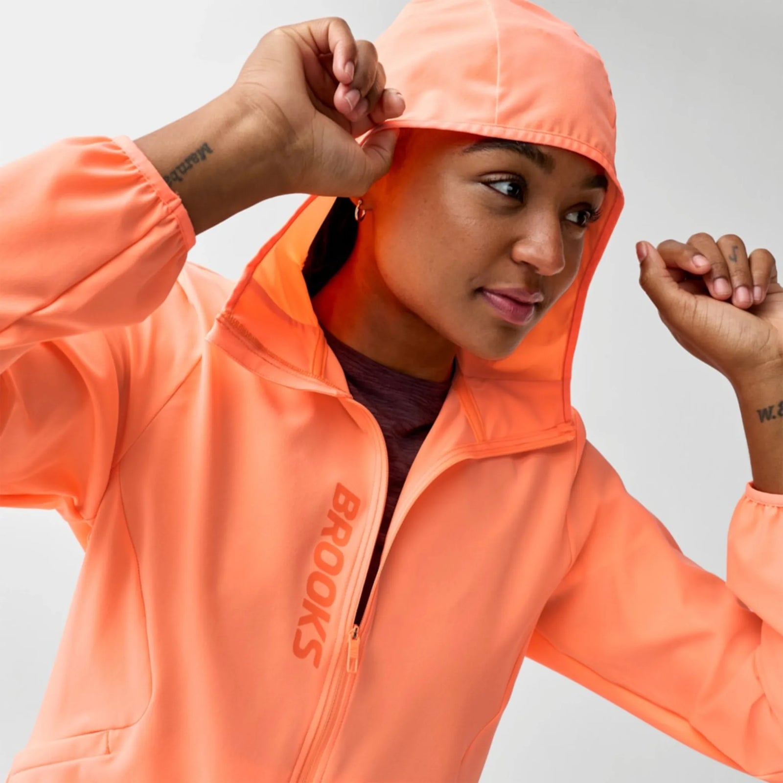 Brooks Canopy Jacket running windbreaker women Cyber Peach - detail
