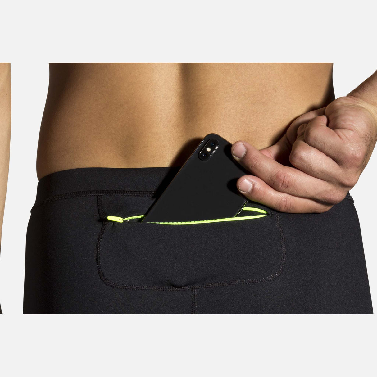 Brooks Carbonite pantalon de course à pied black icy nightlife homme pochette