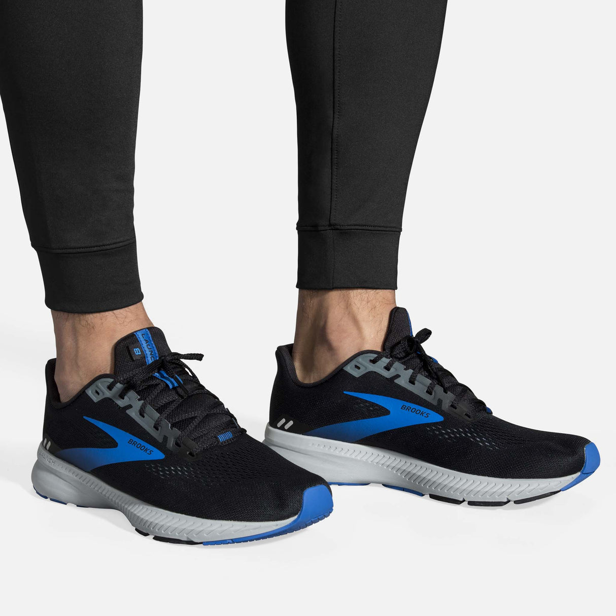 Brooks Spartan Jogger pantalon de course à pied noir homme ourlets