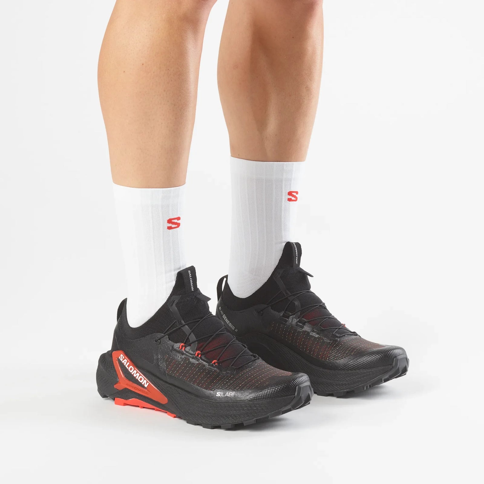 Salomon S/Lab Genesis 2 unisex trail running shoes – Iron / Black / Fiery Red, worn on the trail (action shot)