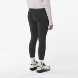 Salomon SHAKEout Core Warm 28 in running tights for women - Deep Black - worn