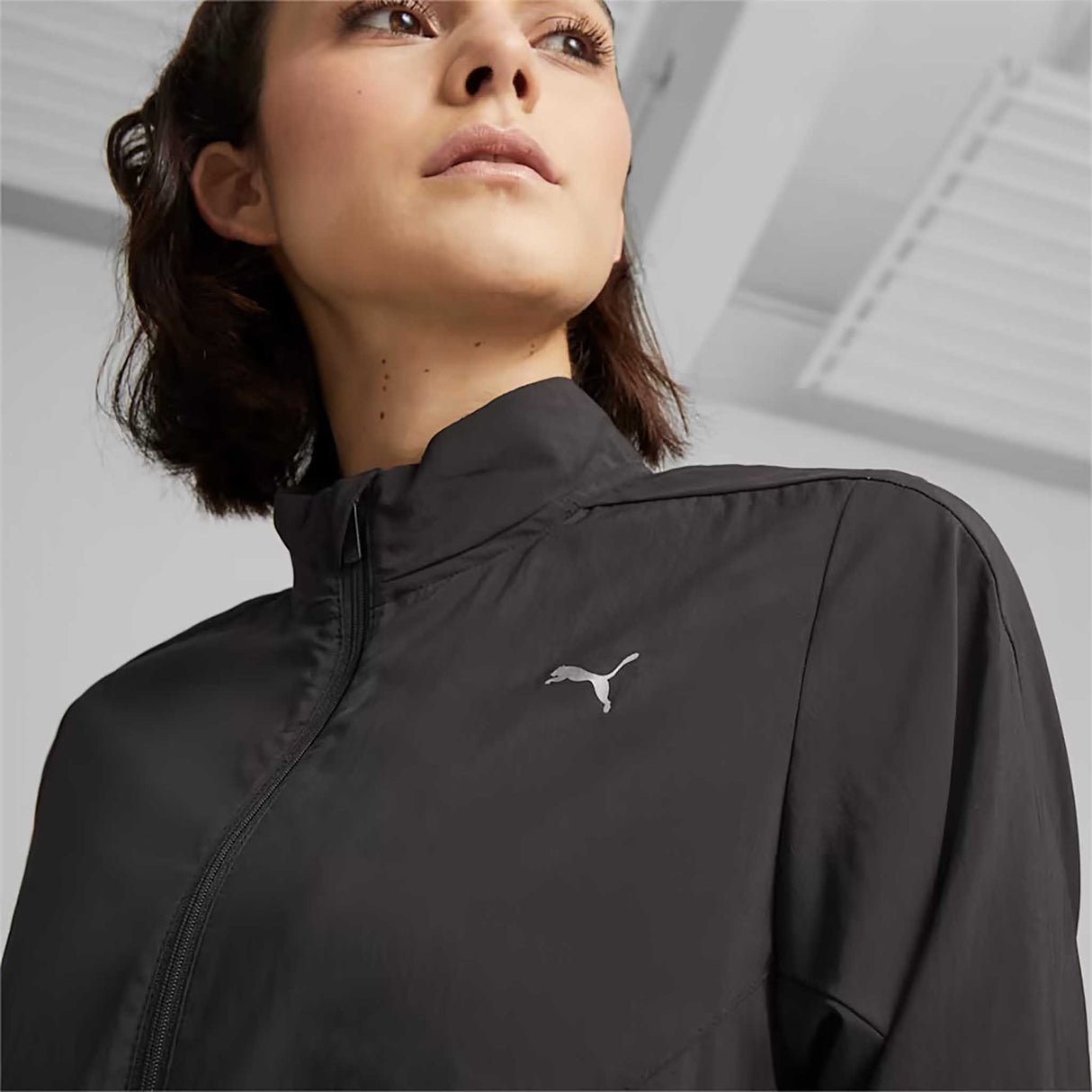 Puma Run Favorite Woven manteau de course à pied femme col -noir