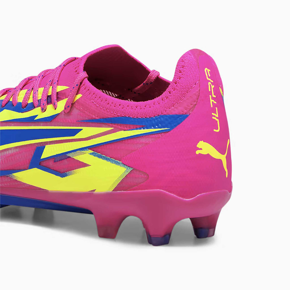 Puma Ultra Ultimate Energy FG/AG chaussures de soccer a crampons talon- Pink / Ultra Blue / Yellow Alert