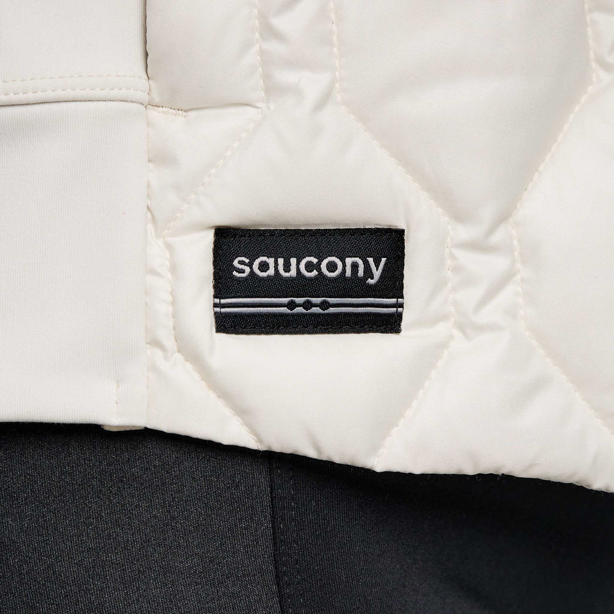 Saucony Solstice Oysterpuff manteau de course à pied femme logo- lin
