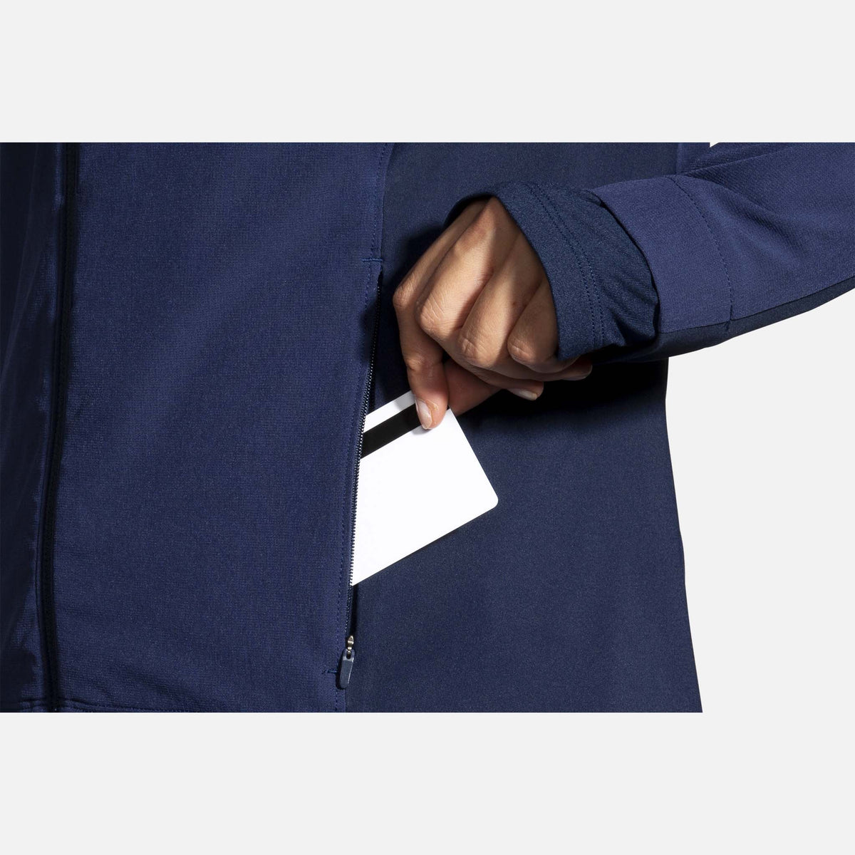 Brooks Fusion Hybrid Jacket manteau de course à pied navy blue bolt pour femme pochette latérale