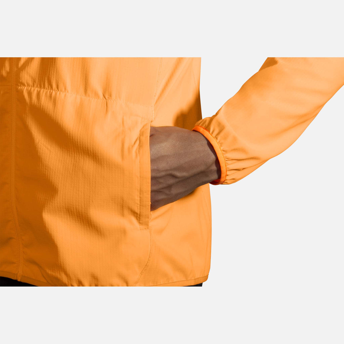 Brooks Canopy Jacket de course orange fluo homme poche
