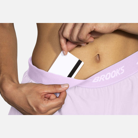 Brooks Chaser 3" shorts course orchid haze femme pochette