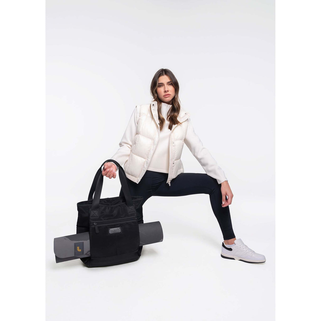 Lolë Lolë veste sans manches compressible en duvet Rose