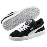 Puma Suede Junior chaussure pour enfant noir blanc paire